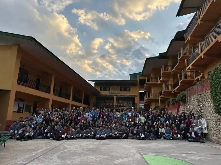 The whole ELC school gathered in the courtyard for morning assembly beneath the classroom balconies